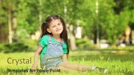  Presentation with grass - Amazing PPT theme having cute-little-girl-sitting and a yellow colored foreground
