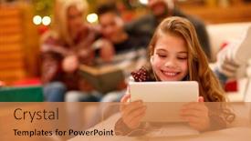  Presentation with christmas girl - PPT layouts consisting of cute little girl with headphones lying and using a tablet on christmas day background and a coral colored foreground