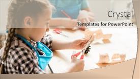  Presentation with paper cutting - Audience pleasing slide deck consisting of cute schoolgirl with scissors sitting by table and cutting paper halloween symbols while making decorations for holiday backdrop and a lemonade colored foreground