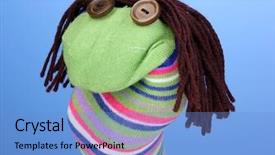  Presentation with theater - Audience pleasing PPT theme consisting of cute sock puppet on blue backdrop and a light blue colored foreground