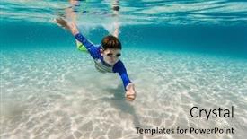  Presentation with turquoise beach - PPT theme having cute teenage boy swimming underwater in shallow turquoise water at tropical beach background and a light gray colored foreground