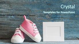  Presentation with baby shoes - Slide deck enhanced with cute tiny baby shoes on a wood with blank photo frame for copy space background and a ocean colored foreground