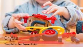  Presentation with nursery - PPT theme having cute two-year old baby girl at home in the nursery playing with constructor background and a red colored foreground