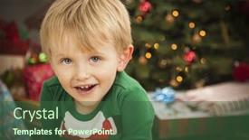  Presentation with christmas tree - Presentation theme having cute young boy enjoying christmas background and a ocean colored foreground