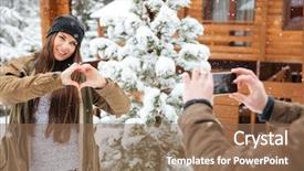  Presentation with weather - Theme enhanced with cute young woman showing heart by hands and posing to her boyfriend taking pictures of her with smartphone in snowy weather background and a violet colored foreground
