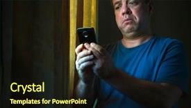  Presentation with smartphone - Audience pleasing PPT theme consisting of sad man with a smartphone backdrop and a wine colored foreground