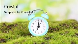  Presentation with alarm - PPT theme with daylight savings time - blue alarm clock on grass background and a soft green colored foreground