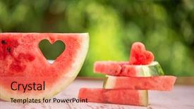  Presentation with slice of decorated cake - Beautiful presentation featuring decorated watermelon slices with heart backdrop and a coral colored foreground