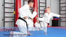  Presentation with karate - Slide deck enhanced with defence - male karate instructor training little background and a light blue colored foreground