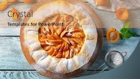  Presentation with apricot - Audience pleasing PPT theme consisting of delicious-apricot-cake-on-wooden backdrop and a coral colored foreground