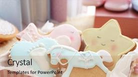  Presentation with babyshower - PPT theme consisting of delicious baby shower cookies closeup background and a coral colored foreground