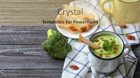  Presentation with walnut - Amazing PPT theme having delicious broccoli soup with walnut in mug on table backdrop and a yellow colored foreground