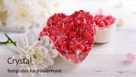  Presentation with shape heart - PPT theme featuring delicious chocolate candies in heart background and a  colored foreground