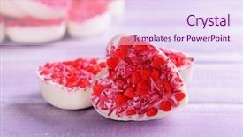  Presentation with shape heart - PPT theme enhanced with delicious chocolate candies in heart shape on table close-up background and a sky blue colored foreground