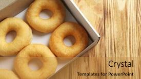  Presentation with donuts - Slide deck having delicious donuts in a cardboard box background and a gold colored foreground
