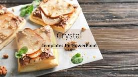  Presentation with chocolate nuts - PPT theme enhanced with delicious pastry with chocolate pear and nuts on wooden table background and a coral colored foreground