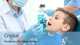  Presentation with diagnosis - PPT theme having diagnosis dental - dentist examining little boy's teeth background and a light blue colored foreground