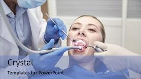  Presentation with dental assistant - Audience pleasing PPT theme consisting of dental air water gun backdrop and a  colored foreground