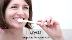  Presentation with dental hygiene - PPT theme having dental hygiene concept - a close-up view of a beautiful woman brushing her teeth background and a coral colored foreground