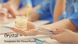  Presentation with jaw - PPT layouts consisting of dental jaw model and tools background and a soft green colored foreground