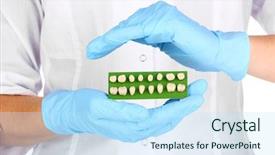  Presentation with denture - Presentation consisting of dentalcollections - denture holding dentist hands background and a sky blue colored foreground