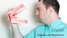  Presentation with dentures - Amazing slide deck having dentist holding oversized false teeth dentures backdrop and a arctic colored foreground