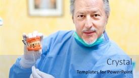  Presentation with denture - Beautiful PPT theme featuring dentist showing a denture backdrop and a light blue colored foreground