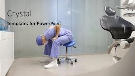  Presentation with dental office - Audience pleasing presentation theme consisting of dentist-stretching-body-caucasian-man backdrop and a light blue colored foreground