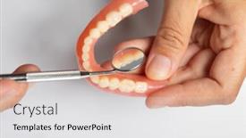  Presentation with prosthesis - Amazing PPT theme having denture-prosthesis-in-doctor-orthodentist backdrop and a white colored foreground