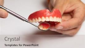  Presentation with prosthesis - PPT layouts featuring denture-prosthesis-in-doctor-orthodentist background and a light gray colored foreground