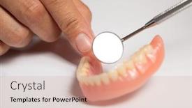  Presentation with prosthesis - Presentation design with denture-prosthesis-in-doctor-orthodontist background and a soft green colored foreground