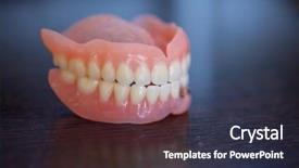  Presentation with denture - Audience pleasing slides consisting of deontology - artificial medical denture on black backdrop and a tawny brown colored foreground