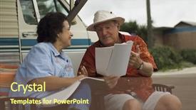  Presentation with magazines - Slide set consisting of happy middle aged couple with magazines relaxing outside their motor home background and a tawny brown colored foreground