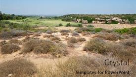  Presentation with rocky - Audience pleasing PPT layouts consisting of deserted-rocky-area-in-sicily backdrop and a coral colored foreground