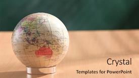  Presentation with front desk - PPT theme featuring desk globe in front background and a coral colored foreground