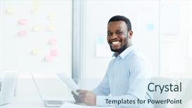  Presentation with african american in computer - Slide set having desk with laptop and paper background and a sky blue colored foreground