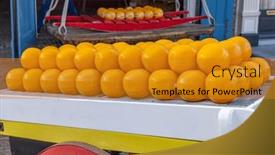  Presentation with cheese - Presentation theme consisting of detail-of-edam-cheeses-town background and a gold colored foreground