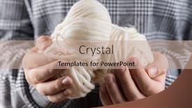  Presentation with knitting - Slide set having detail of hands holding white wool for knitting background and a coral colored foreground