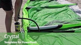  Presentation with kite - Amazing presentation theme having details of a man pumping air in to a kite backdrop and a seafoam green colored foreground