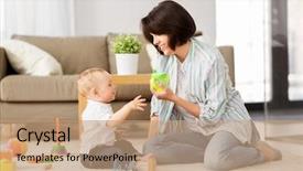  Presentation with happy baby - PPT layouts with developmental toys and sippy cup background and a coral colored foreground