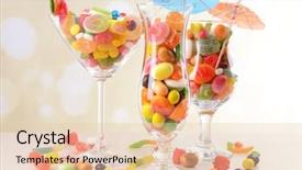  Presentation with candy - Presentation theme enhanced with different colorful fruit candy in glasses on table on light background background and a lemonade colored foreground