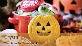  Presentation with skull - Beautiful PPT theme featuring different halloween candies and cookies on a table decorated with some scary ornaments such as a skull cobwebs or a carved pumpkin backdrop and a gold colored foreground