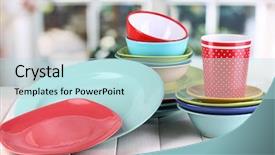  Presentation with tableware - Theme enhanced with dinner set - colorful tableware on wooden table background and a  colored foreground