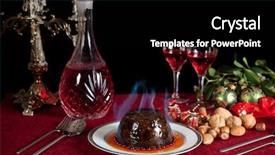  Presentation with christmas dinner - Audience pleasing PPT theme consisting of dinner table with xmas pudding backdrop and a  colored foreground