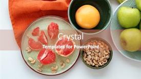  Presentation with peanuts - PPT theme having dishware with fruits and peanuts on table background and a coral colored foreground