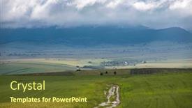  Presentation with green hills - Colorful presentation theme enhanced with dramatic-sky-before-storm-over backdrop and a tawny brown colored foreground