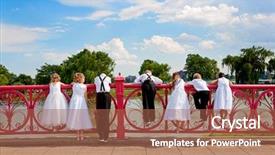  Presentation with wedding anniversary party invitation - PPT theme consisting of dressed up in a wedding background and a red colored foreground
