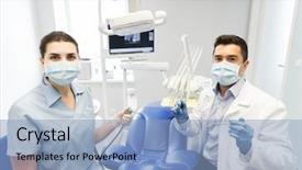  Presentation with dental assistant - Slide set with drill and air water gun background and a light blue colored foreground