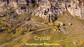  Presentation with cave - Presentation design featuring drone-aerial-view-of-vardzia background and a tawny brown colored foreground
