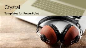 Presentation with speaker - Presentation featuring ear listening speaker - laptop and earphones on wooden background and a  colored foreground